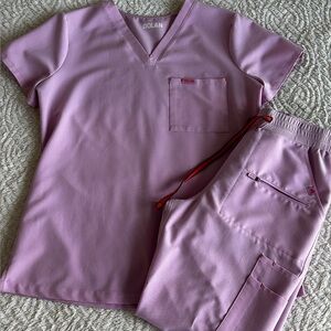 Dolan scrubs top size small, pants XS short (they run big so fit like a small).